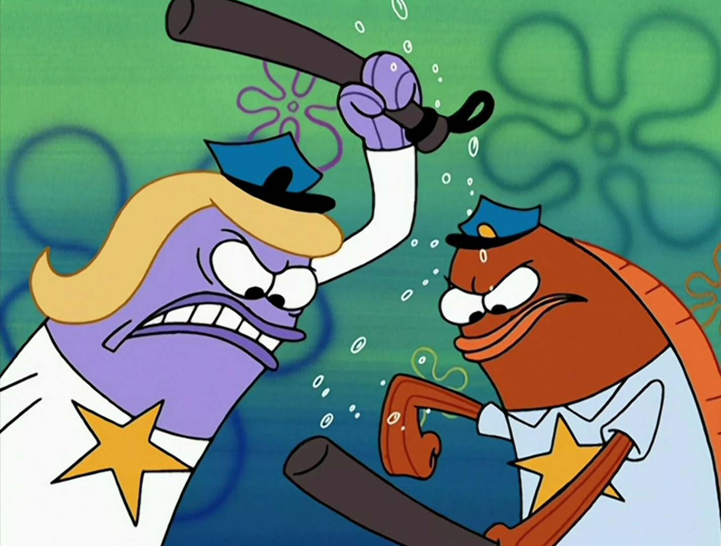 Polisi memberi pentungan